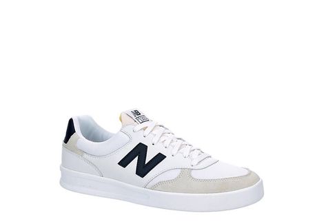 is a lightweight, breathable, and durable shoe that is perfect for tennis or other court sports. #newbalance #tennis Every Man Should Own, White New Balance, New Balance Mens, Formal Dress Shoes, White Shoes Men, Rugged Boots, White Tennis Shoes, Sleek Dress, Rack Room