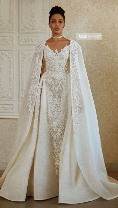 Bridal Dress Cape, Saiid Kobeisy Bridal, Long Tight Dresses, Long Tight Dress, Wedding Dress With Cape, White Beaded Dress, Saiid Kobeisy, Muslimah Wedding Dress, Cape Wedding