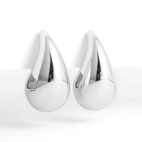 Buy Silver Cascade Teardrop Earrings exclusively on www.shopperspointindia.com Discover the elegant simplicity of our Silver Cascade Teardrop Earrings. Expertly crafted with high-quality silver, these earrings feature a delicate cascade design that adds a touch of sophistication to any outfit. Perfect for any occasion, these earrings elevate your style with their timeless beauty. #silverearrings #teardropearrings #dangleearrings #giftideasforher #jewelryoftheday #timelessjewelry #versatilejew... Silver Teardrop Earrings, Teardrop Silver Earrings, Cascade Design, Timeless Jewelry, Elevate Your Style, Teardrop Earrings, Timeless Beauty, Your Style, Silver Earrings