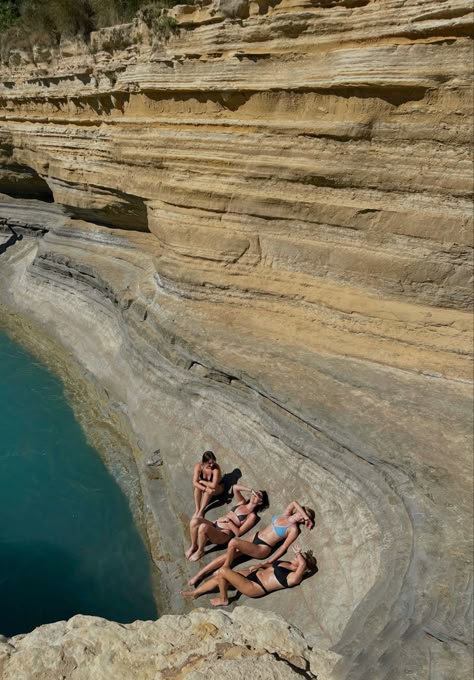 Four girls laying on a rock in Greece Corfu Greece Picture Ideas, Corfu Picture Ideas, Greece Trip Aesthetic, Greece Instagram Pictures, Corfu Greece Aesthetic, Greece Girls Trip, Sidari Corfu, Greece Travel Aesthetic, Greece Island Hopping