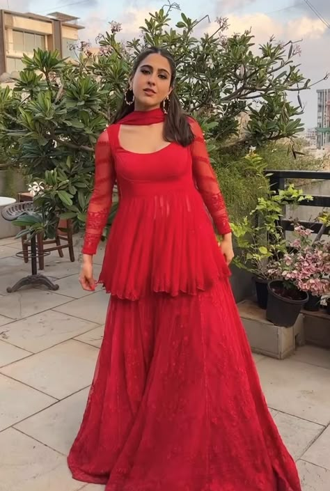 Red Garara Dress Simple, How To Style Sharara Suit, Sara Ali Khan Red Suit, Red Sarara Dress, Paplon Design Suit, Red Gharara Outfit, Red Sharara Outfit, Sara Ali Khan Sharara, Red Garara Dress