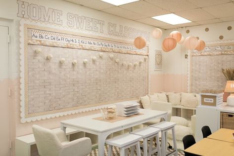 Part 2 of our classroom makeover reveal! Keep swiping to see all of the tiny details that make this room so magical! ✨😍 Click the link in our bio to shop this collection! #classroommakeover #classroomreveal #classroomtransformation #classroomsetup #classroomideas #classroomdecor #neutralclassroom #bohoclassroom #calmclassroom #teacherdecor #teachersofinstagram Classroom decor ideas Calm classroom ideas Neutral classroom decor Classroom makeover Classroom setup Boho vibes White Brick Classroom Decor, Classroom Fridge Bulletin Board, Better Than Paper Bulletin Board Ideas, Lights Bulletin Board, Boho Bulletin Board Ideas, Cozy Classroom Ideas High School, Teacher Desk Area Classroom Setup, Simple Classroom Decor, Boho Bulletin Board