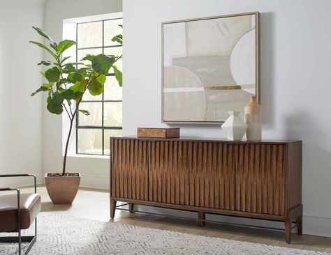 Experience the magic of mid-century modern design as you revel in the practicality of our Delray console. Immerse yourself in the nostalgia of a time gone by, while enjoying the convenience of state-of-the-art storage solutions. #homefurnishings #martinfurniture #martinhomefurniture #designinspo #entertainmentfurniture #accentfurniture #furniture #interiordesign #freshdesigns Credenza Office, Office Console, Credenza Decor, Mid Century Console, Bookcase With Glass Doors, Mid Century Modern Wood, Living Room Console, Home Refresh, Furniture Material