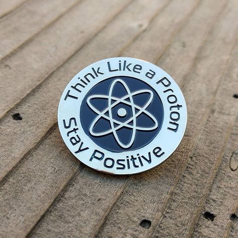 Think Like a Proton Stay Positive Enamel Pin - A cute and inspiring enamel pin to remind you to stay positive. Perfect for scientists, teachers, or anyone who loves science! #enamelpin #science . #Think_Like_A_Proton #Science_Pins #Backpack_Pins #Butterfly_Clutch Think Like A Proton, Science Pins, Astronomy Jewelry, Backpack Pins, Jacket Pins, Funny Hats, Soft Enamel Pins, Cool Pins, Hat Pin