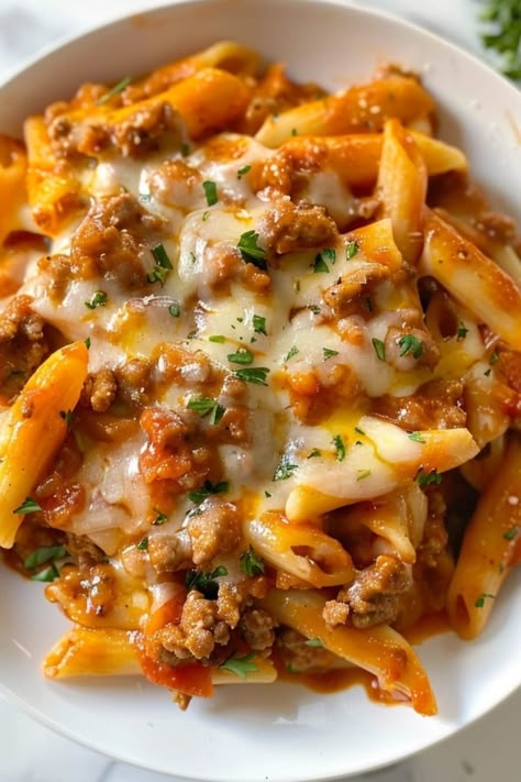 This Italian sausage pasta is totally restaurant-worthy! Penne pasta is mixed with a creamy tomato meat sauce for a meal you won't forget. Pasta And Meat Casserole, Italian Sausage And Noodles Recipes, Italian Sausage Rotini Pasta Recipes, Sausage Rose Pasta, Tomato Sauce With Sausage, Noodle Sausage Recipe, Spaghetti Pasta Ideas, Creamy Spicy Italian Sausage Pasta, Easy Creamy Sausage Pasta