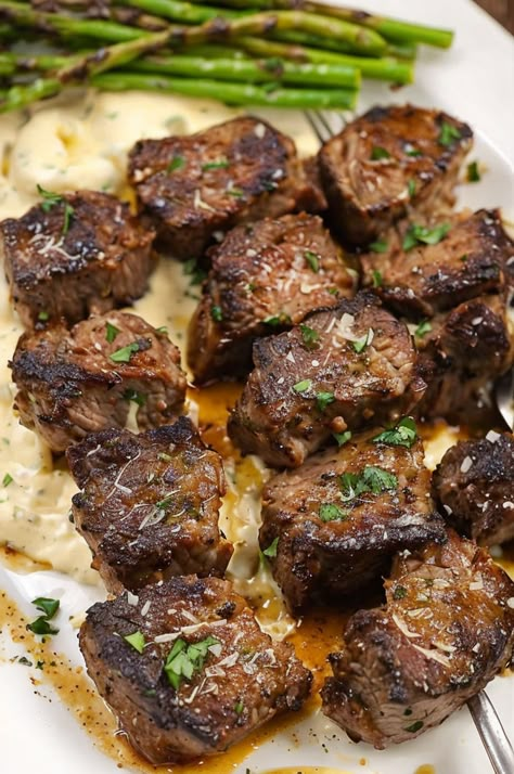 Succulent Garlic Butter Steak Bites with rich Parmesan Cream Sauce—your perfect quick and savory dinner fix! Ready in just 30 mins. #SteakBites #GarlicButter #ParmesanSauce #QuickDinner #EasyRecipes Recipes For Dinner Aesthetic, Filet Steak Bites, 5 Course Meals, Steak Tidbits Recipes, Think Steak Recipes, Best Side With Steak, Keto Recipes Steak, Top Loin Steak Recipes, Winter Steak Recipes