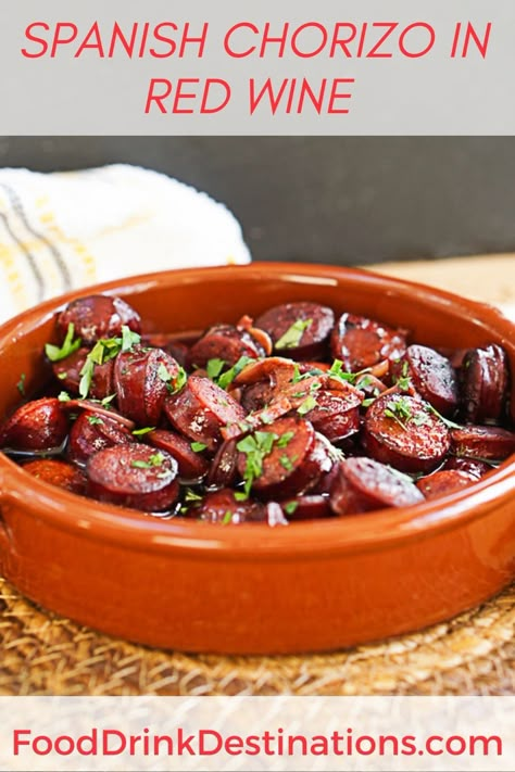 This chorizo al vino tinto recipe is a classic tapas recipe for Spanish chorizo in red wine. It’s common at tapas bars in Spain and easy to make at home with only 6 ingredients. I learned to make this dish when we lived in Spain and now make it when we do tapas nights. Red Wine Chorizo, Tapas Chorizo Recipes, Mediterranean Tapas Ideas, Spanish Chorizo Tapas, Spanish Starters Appetizers, Spanish Tapas Party Appetizers, Chorizo Appetizers For Party, Chorizo In Red Wine, Tapas Style Dinner