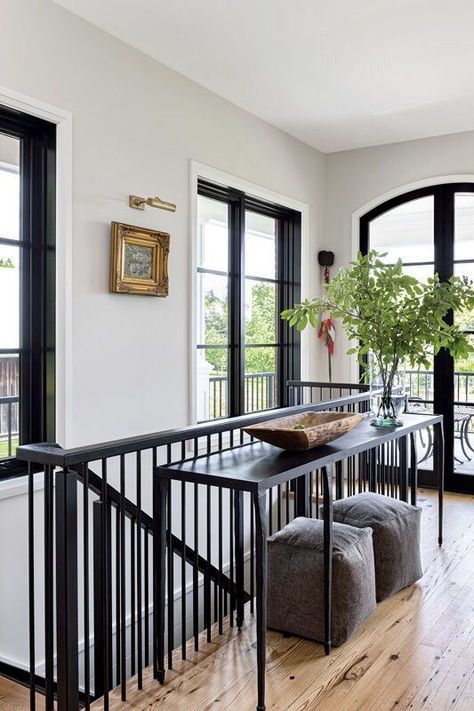 DESIGN | ... inspired by this modern farmhouse via House & Home Magazine: “ The interiors are calm and compatible with the exterior style of the house but get graphic punch with black window frames, and a dark railing and console.” / #modernfarmhousedecor #farmhouse #black Replacing Windows, Black Window Frames, Elegant Lifestyle, Black Window, Interior Windows, Black Windows, Modern Windows, Farmhouse Interior, House Windows