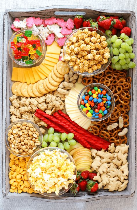 Movie Night Snack Board | Simply Made Recipes Movie Night Snack Board, Snack Boards, Movie Night Food, Charcuterie Ideas, Movie Night Snacks, Snack Platter, Sleepover Food, Charcuterie Board Ideas, Charcuterie Inspiration