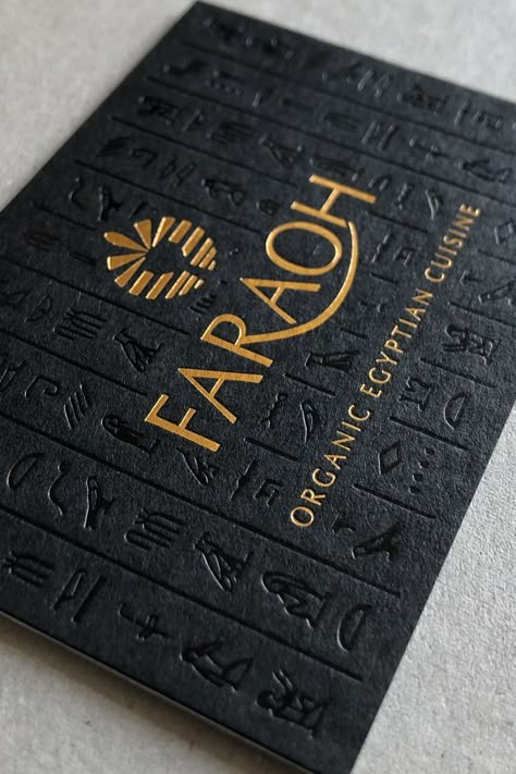 Antique gold foil logo and gloss black foil printed hieroglyphics on black card. Black Gold Packaging Design, Gold Black Packaging, Black And Gold Packaging Design, Gold Foil Printing, Business Card Black And Gold, Black Gold Business Card, Gold And Black Branding, Black And Gold Graphic Design, Black Packaging Ideas