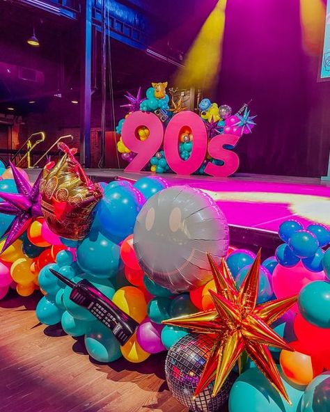 Balloon Therapy on Instagram: "welcome to the 90s 💜💖💙 #balloontherapy   Part 2 of this unforgettable 90's themed party! Stay tuned for part 3 tomorrow 😎  Special thanks to @modernpartycompany @gilleysdallas @shagcarpetprops & @glopartyandco!  • • • • • #balloongarland #dallasevents #dallasballoons #balloonartist #organicballoons #eventballoons #ballooninstallation #balloondecoration #decadesparty #80sbaby #90sbaby #90saesthetic #90sstyle #90sparty #retroaesthetic #90svintage #80saesthetic #retrothemeparty #decadestheme #throughthedecades #neonaesthetic #neonballoons #90sthemeparty #corporateevents #corporateballoons #retroballoons" 90s Decor Party, Classy 90s Party, Mtv Themed Party, 90s Balloons, 90s Prom Aesthetic, 90s Party Aesthetic, 90s Party Theme, Mtv Party, Balloon Therapy