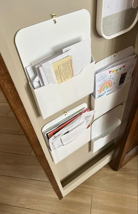 Hanging file folders on a pull out bulletin board as the family command center. File Desk Organizer, Incoming Mail Organization, Paper Holder Organizer, Hanging Paper Organizer, Wall Filing System, Wall Mounted File Organizer, Refrigerator Magnets Organization, Wall Mail Organizer Ideas, Countertop Mail Organizer