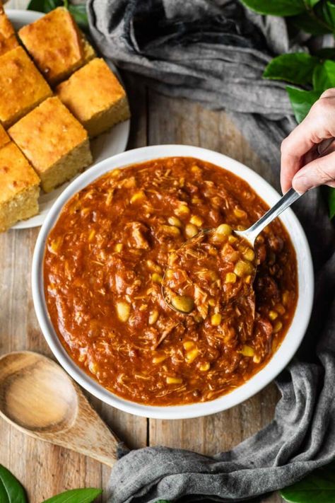 Georgia Brunswick Stew: tasty Southern recipes can bring families together by enjoying homemade cooking at weeknight dinners, and this Brunswick stew recipe is no exception. Pulled pork, chicken, tomatoes, and other veggies simmer together in this country comfort food. | www.savortheflavour.com #brunswickstew #southernfood #comfortfood #recipes #souprecipe Brunswick Stew Recipe Georgia, Brunswick Stew Recipe, Broccoli And Stilton Soup, Cabbage Wedges, Roasted Cabbage Wedges, Chicken Tomatoes, Brunswick Stew, Pork Chicken, Roasted Cabbage