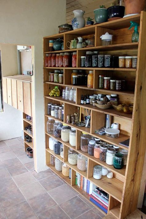 Our custom built homestead pantry was designed to fit gallon, half gallon, and quart sized mason jars to maximize space and efficiency! We were able to store so much food in our 350 square foot tiny house! Learn more at Homestead Honey.  #pantry #foodstorage #tinyhouse #DIY Pantry Homestead, Ultimate Pantry, Free Standing Pantry, Canned Good Storage, Homestead Pantry, Standing Pantry, Canning Storage, Homestead Kitchen, Custom Pantry