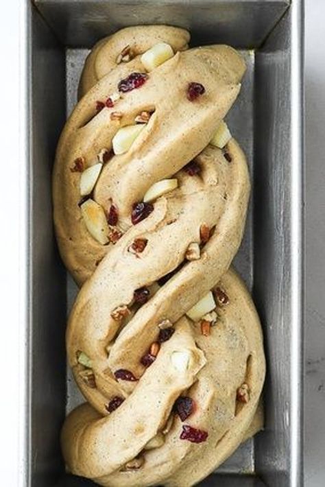 This yeast-raised apple cranberry bread is soft, tender and delicious. It’s slightly sweet, with a bit of crunchy pecans, pieces of dried cranberries and chopped apple throughout, and hints of cinnamon and vanilla. Serve this apple cranberry bread as delicious snack, or side for breakfast and brunch, and even a good base for French toast and bread pudding. | bread recipes homemade | sweet bread recipes homemade | apple cranberry bread recipe | how to make homemade bread | apple cranberry recipes Homemade Apple Bread Recipe, Yeast Breads Sweet, Apple Artisan Bread, Cinnamon Cranberry Bread, Crusty Cranberry Nut No Knead Bread, Raising Bread Recipe, Homemade Breakfast Bread Recipes, Apple Yeast Bread Recipe, Cinnamon Wreath Bread