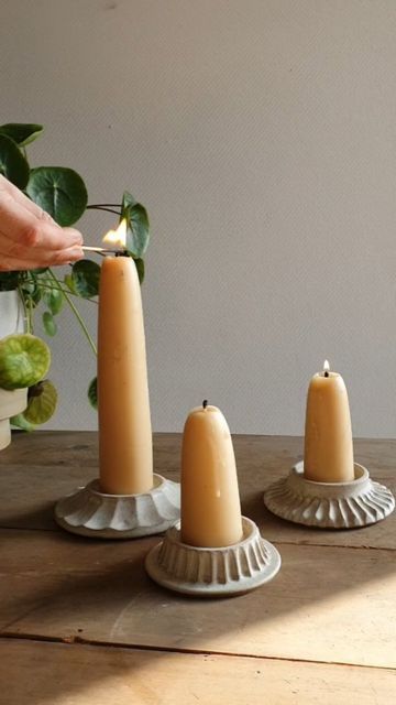 Hilda Carr Pottery on Instagram: "Lots of new things out of the kiln this morning including a few of these candle plates. They'll be available 👉🏻 THIS THURSDAY 17TH at 7pm 👈🏻 (hooray!) And there'll be the option to purchase them with or without a pair of these gorgeously chunky beeswax candles. - - #hyggehome #ceramics #myhomestyle #myhomevibe #myscandihome #pottery #handcarved #handmadeceramics #handmadepottery #wheelthrown #shopsmall #justacard #wearethemakers" Pottery Candle Stick, Diy Pottery Candle Holder, Hand Built Pottery Candle Holder, Pottery Without A Wheel, Pottery Candle Holders Ideas, Creative Ceramics Ideas, Candleholder Ceramic, Chunky Candle Holders, Diy Candle Stick Holder