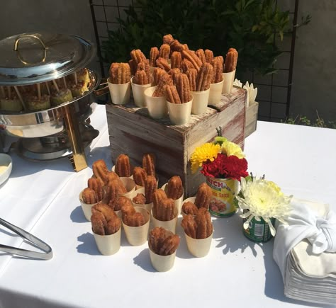 With individual servings a paramount need for event menus during the pandemic, our churros station has proven a huge hit with guests as a sweet dessert to round out the meal or featured in a morning meal service. Our servers report a steady flow of people returning for "seconds"! #privateeventcatering #privateeventplanning #BayAreaCateringService #HandheldCateringandEvents Churros Serving Ideas, Churro Station Wedding, Churros Party Display, Churro Party Ideas, Churro Party, Churro Station, Build Your Own Food Bar, Mexican Catering, Christmas Fiesta