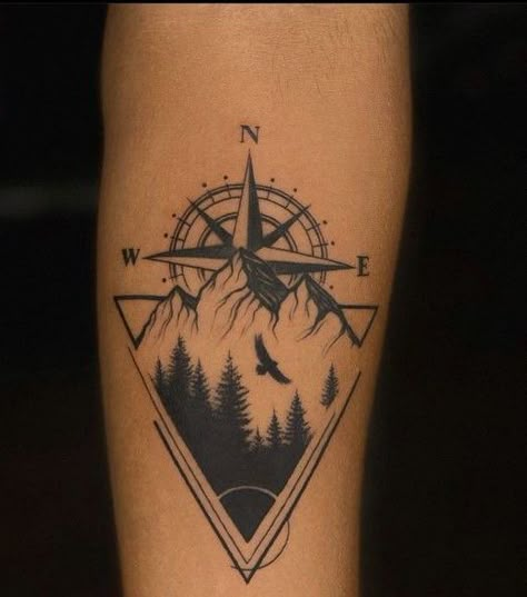 Finding True North: The Allure of Compass Tattoos for Men 2023 - mens-club.online Hiking Tattoos Men, Compass Tattoo Design Men Leg, Outdoor Theme Tattoo Sleeve, Adventure Compass Tattoo, Male Arm Tattoo Ideas, Male Arm Tattoos Forearm, Compass With Mountains Tattoo, Compass Tattoo Design Men Forearm, Nature Band Tattoo