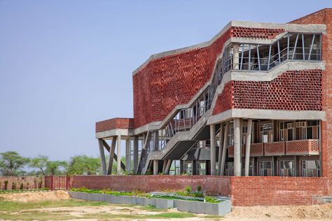 Zero Energy Design Lab creates Girls' Hostel Block with hollow-concrete facade Perforated Concrete, Exterior Staircase, Girls Hostel, Global Architecture, Zero Energy Building, Hostels Design, Penghematan Energi, Concrete Facade, Zero Energy