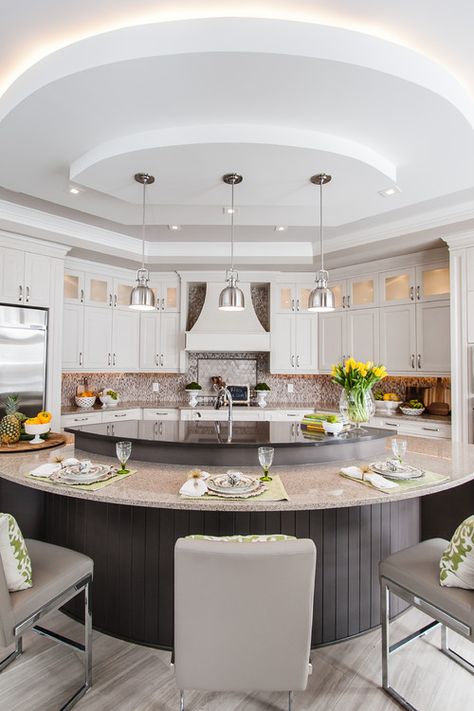 If you’re looking to add personality to your kitchen layout, a circular island may be for you. The design can go full circle or feature a half-moon. Hiasan Dalaman Dapur, Dapur Moden, Kitchen Open Concept, Curved Kitchen Island, Curved Kitchen, Best Kitchen Design, Custom Kitchen Island, Round Kitchen, Kitchen Island With Seating