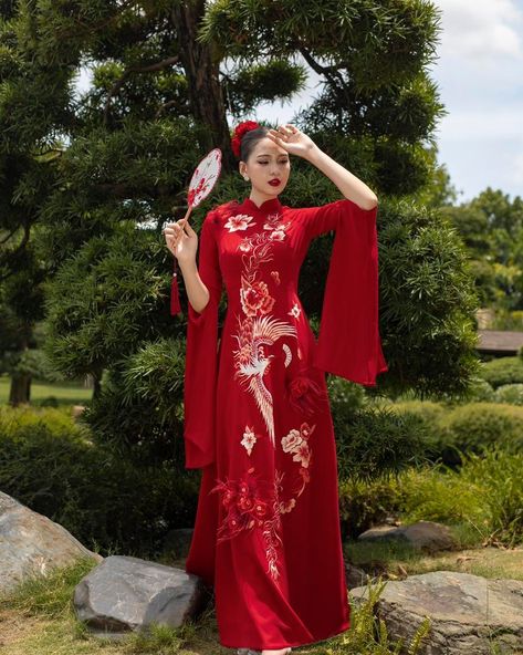 Ruby red 🌹 Introducing our stunning red áo dài gowns from the new collection! These pieces feature dramatic sleeves, intricate back details, and breathtaking embroidery, including magnificent phoenix designs that symbolize grace and renewal. Each gown is a masterpiece, perfect for brides looking to make a bold and beautiful statement on their special day. 🔥👰‍♀️ Shop now via the link in our bio. #AoDaiCollection #RedAoDai #PhoenixEmbroidery #dreamdressesbypmn #modernweddingdress #longs... Ao Dai Red, Bridal Ao Dai, Phoenix Embroidery, Wedding Ao Dai, Red Ao Dai, Modern Bridal Dress, Ao Dai Vietnamese, Embroidery Collar, Vietnamese Wedding