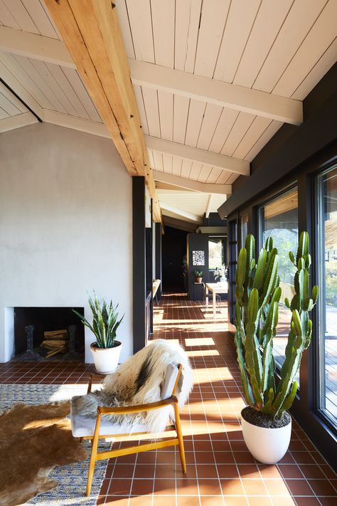 One of the defining design elements of the home is that the entire floor is made up of original terra-cotta tiles which only required a cleaning. Terracotta Tile Floors, Terracotta Tile Floor, Mid Century Modern Ranch, Terracotta Floor, Mid Century Living, Modern Ranch, Mid Century Living Room, Mid Century Modern Living, Mid Century Modern Living Room