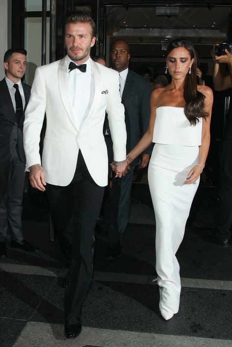 Victoria and David Beckham Are a Picture-Perfect Met Gala Couple: Victoria Beckham had her husband, David Beckham, by her side when she arrived at the 2014 Met Gala in NYC on Monday, and they even shared a kiss on the red carpet. White Tux, Victoria And David, Wedding Tux, Dressed In White, Groom Wedding Attire, David And Victoria Beckham, Wedding Suits Groom, Groom Tuxedo, White Tuxedo