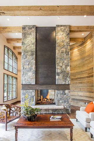 Fireplace - stone with ibeam and metal accent Rustic Contemporary Fireplace, Freestanding Stone Fireplace, Indoor Rock Fireplace, Metal And Stone Fireplace, Modern Stacked Stone Fireplace, Metal Fireplace Mantel, Modern Stone Fireplace Ideas, Stone Wall Fireplace, Modern Stone Fireplace