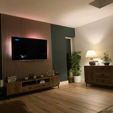 Moody Paneling, Wooden Wall Tv Panel, Living Room Wood Slat Wall, Slat Feature Wall Living Room, Wood Panels Living Room Wall, Green Tv Feature Wall, Slat Wall Living Room Tv, Lounge Wood Panelling, Panelled Walls Small Living Room