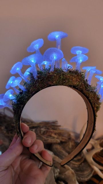 MUSHROOM QUEEN on Instagram: "Glowing mushroom fairy crown! For those might be Interested these I'm asking 60$ plus shipping! I'd be more then happy to create custom crowns as well! #mushroomartist #glowingmushroom #crown #fairycore #fairycrown #fairycosplay #mushroomfairy #mushroomlight #mushroomlights #handmadeart" Fairy Queen Cosplay, Fairy Crown Tutorial, Mushroom Faerie Costume, Forest Fairy Decor, Mushroom Fae Costume, Glowing Mushrooms Diy, Mushroom Umbrella Diy, Easy Diy Mushroom Decor, Diy Fairy Crown Headpieces