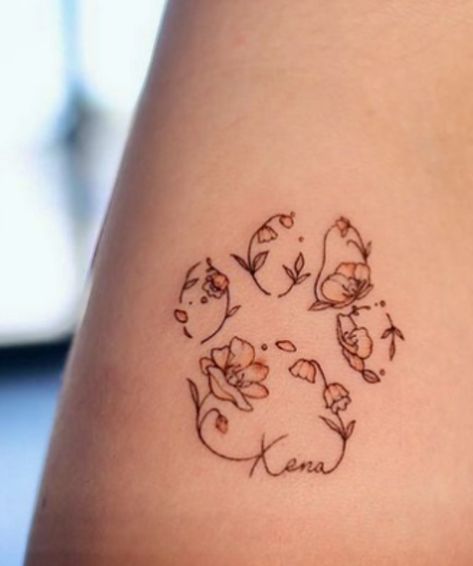 Floral Dog Paw Print Tattoo, Dogs In Heaven Tattoo, Tattoo Ideas Of Dogs, Paw Print Tattoo On Wrist, Dog Print Flower Tattoo, Paw Print Tattoo On Ankle, Paw Print Sunflower Tattoo, Dog Flower Tattoo Ideas, Yorkiepoo Tattoo