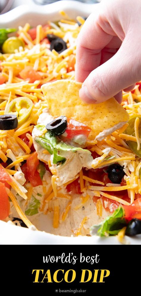 The only Taco Dip you’ll ever need—a thick layer of taco seasoned cream cheese & sour cream topped with crisp lettuce, diced tomatoes, olives, spicy jalapeños and cheddar cheese. Like the best taco in dip form! | Recipe at BeamingBaker.com Taco Dip Recipe With Cream Cheese, Taco Dip Recipe Easy, Taco Party Dip, Taco Dip Appetizer, The Best Taco Dip, 6 Layer Dip, 7 Layer Dip With Cream Cheese, Homemade Taco Dip, Classic Taco Dip