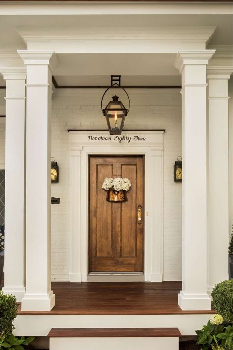 Front door of classic traditional house by The Fox Group. #frontdoor #classicarchitecture #housedesign #houseexterior #beautifulfrontdoor Timeless Home Design, The Fox Group, Fox Group, Exterior Columns, Front Porch Columns, Outdoor Columns, Brick Columns, Bathroom Freestanding, White Exterior Houses