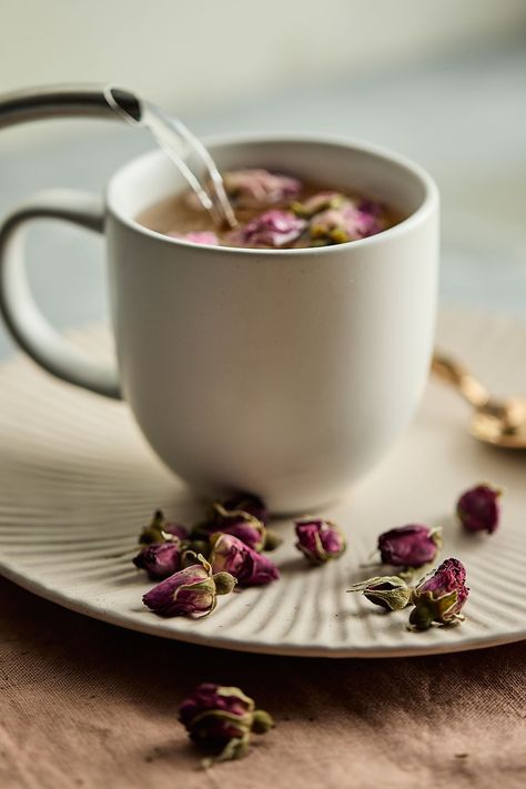 Calming and aromatic, rosebud tea offers a delicate fragrance that instantly relaxes the mind and soul. These high-quality rosebuds can be brewed as a hot or cold floral tea, added to other teas as a flavor enhancement, or used as an accent for mocktails and baked goods.  Brewing instructions: Pour boiling water over 4-5 flowers. Steep for 3 minutes and enjoy. Herbal Tea Photography, Bay Leaf Tea, Pumpkin Hot Chocolate, Photography Tea, Tulsi Tea, Cinnamon Benefits, Tea Brewer, Tea Brands, Single Origin