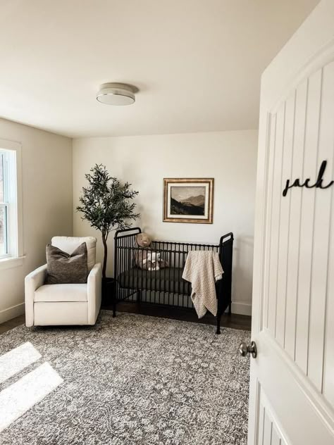 Nursery With Dark Carpet, Nursery With Dark Wood Trim, Dark Floor Nursery Ideas, Mixing Wood Tones Nursery, Nursery Organic Modern, Organic Neutral Nursery, Tan Walls Nursery, Nursery Dark Floors, Natural Neutral Nursery