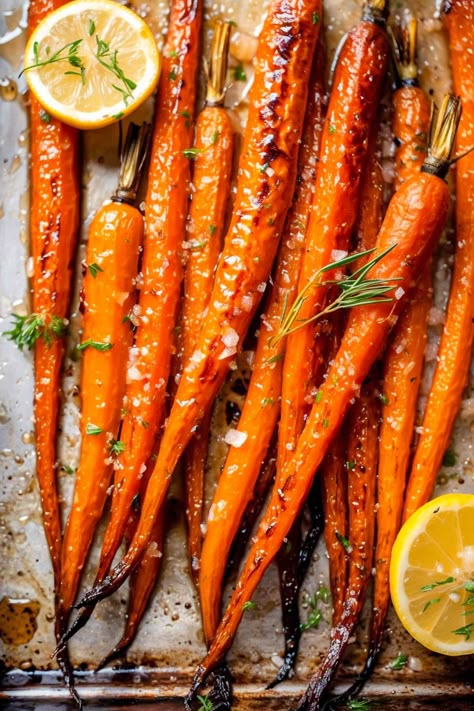 Got 30 minutes? That's all it takes for these oven-roasted maple carrots! Perfectly caramelized, with a hint of brown sugar sweetness, these carrots are the ultimate holiday side. Easy prep, unforgettable taste. Click for this quick, delicious recipe! Maple Carrots, Carrots In Oven, Carrot Recipes Side Dishes, Maple Roasted Carrots, Maple Glazed Carrots, Glazed Carrots Recipe, Thanksgiving Vegetables, Easy Vegetable Side Dishes, Baked Carrots