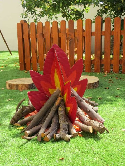 What a wonderful camp fire!! So easy to make!! See more party ideas and share yours at CatchMyParty.com #catchmyparty #partyideas #campingparty #fire #campingpartydecorations Campfire Diy, Fake Campfire, Safari Birthday Party Ideas, Camping Party Decorations, Camp Vbs, Campfire Party, Camping Theme Birthday, Lumberjack Party, Camping Theme Party