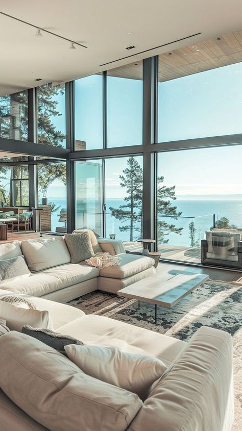 Luxurious oceanfront living room with panoramic sea views, elegant furnishings, and modern decor Beautiful Views From Windows, Furnished Living Room, Panoramic Windows, To Love And Be Loved, Dream Life House, Neutral Color Palette, Floor To Ceiling Windows, Coastal Home, Neutral Colour Palette