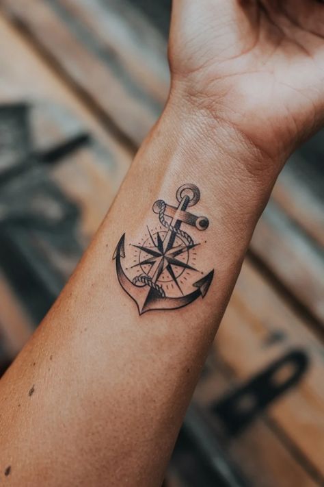 Anchor and compass tattoo on a person's forearm. Navy Symbol Tattoo, Anchor Bracelet Tattoo, Tiny Nautical Tattoo, Anchor Tatoos Woman, Tattoo Anchor Women, Lake Life Tattoo, True North Tattoo Ideas, Tattoo Ideas Anchor, Compass Anchor Tattoo Design