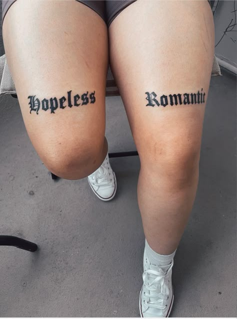 Chest Tattoos For Women Unique, Upper Knee Tattoo Women Words, Tattoo Word Ideas, Knee Tattoo Words, Over The Knee Tattoo, Hopeless Romantic Tattoo, The Knee Tattoo, Back Of Leg Tattoos, Romantic Tattoo