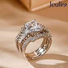 https://encrypted-tbn0.gstatic.com/images?q=tbn:ANd9GcTLiFWfZkQmymmIDcf_8Nb3-9rnUVXtDnDxoQ&usqp=CAU 10 Year Wedding Ring, Wedding Ring Upgrade, Asscher Cut Diamond Engagement Ring, Jeulia Jewelry, Expensive Wedding Rings, Big Wedding Rings, Emerald Cut Diamond Engagement Ring, Ring My Bell, Wire Jewelery