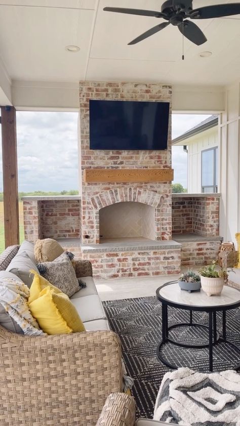 Instagram Back Porch Built In Fireplace, Back Patio Ideas With Fireplace, Simple Back Porch Fireplace, Outside Brick Fireplace, Outdoor Patio Ideas Fireplace, Patio Fireplace Wall, Porch Fireplace Ideas Farmhouse, Outdoor Fireplace With Wood Storage On Sides, Outdoor Porch Fireplace Ideas