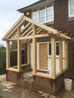 Entrance Porch Design, Porch Extension With Toilet, Porch Ideas Entrance, Timber Frame Extension, Porch Extension, Minwax Stain Colors, Timber Frame Porch, Glass Porch, Porch Canopy