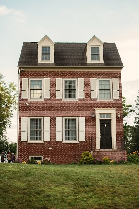 Red Brick White Shutters, Red Brick House White Shutters, White Shutters On Brick House, Brick House White Shutters, Red Brick Black Roof, Brick House Shutters, Partial Brick House Exterior, Brick House With Shutters, House With White Shutters