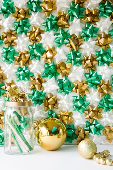 DIY Christmas Gift Bow Backdrop | Studio DIY®Christmas bows backdrop Bow Backdrop, Diy Christmas Photo, Christmas Gift Bow, Holiday Photo Booth, Christmas Party Backdrop, Photography Backdrops Diy, Photo Backdrop Christmas, Christmas Bows Diy, Diy Photo Backdrop