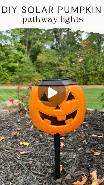 Courtney Hamilton on Instagram: "DIY solar pumpkin lights!  I used $1.98 pumpkin buckets and solar pathway lights for this project.  I made a small hole and cut a few slits in the bottom of the pumpkin and pushed the pathway light through it. (Make sure the hole is slightly smaller than the post to the light so the pumpkin doesn’t fall down). Stick in the ground and wait till you see how cute these are at night!  Remove the pumpkin after Halloween and use the pathway lights year round.  Comment PUMPKIN and I’ll message you the links to items I used.  Thanks for this great idea @kelsimsavage 🎃 #diy #halloween #halloweendiy #pumpkins #halloweendecor #falldecor #outdoorlighting #fall #falldecor #outdoor #halloweenideas 

Follow my shop @athomewiththehamiltons on the @shop.LTK app to shop thi Pumpkin Decoration Outdoor, Solar Halloween Decorations, Pumpkin Yard Decorating Ideas, Plastic Pumpkin Over Solar Lights, Diy Outdoor Solar Lights, Halloween Uplighting Outdoor, Round Garden Ideas, Pumpkin Pathway Lights, Pumpkin Lights Outside