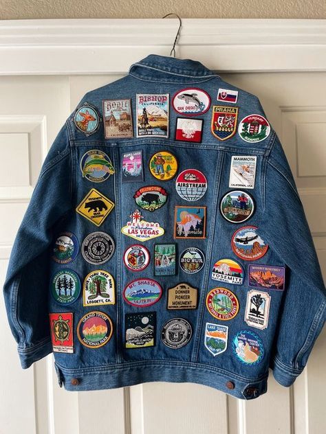 15 Fab Stagecoach Outfit Ideas You Must Try Travel Jacket Patches, Denim Jacket Craft Ideas, Sweaters With Patches, Iron On Patch Jean Jacket, Travel Patches Ideas, Diy Patch Denim Jacket, Denim Jacket Patches Inspiration, Denim Jacket Patches Aesthetic, Denim Jacket With Patches Diy