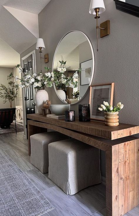 Your entryway sets the tone for your entire home, making it the perfect place to showcase your personal style and welcome guests with open arms. Whether you’re a lover of modern minimalism, rustic farmhouse charm, or eclectic bohemian vibes, there’s an entryway table decor idea waiting to transform your space. In this post, I’ve curated a collection of 30+ entryway table decor ideas that promise to breathe new life into your foyer. Living Room Entry Table, Entryway Decor Modern, Entry Inspiration, Foyer Console Table, Entrance Table Decor, Hallway Table Decor, Classic Reception, Entryway Table Decor Ideas, Different House Styles