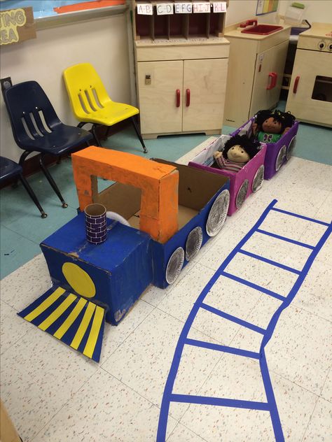 Train made out of card board boxes in my dramatic play center  #train Train Preschool Theme, Train Provocations, Train Ideas For Preschool, Transportation Theme Dramatic Play, Train Dramatic Play Preschool, Transportation Theme Preschool Dramatic Play, Train Dramatic Play, Bus Dramatic Play, Train Sensory Bin