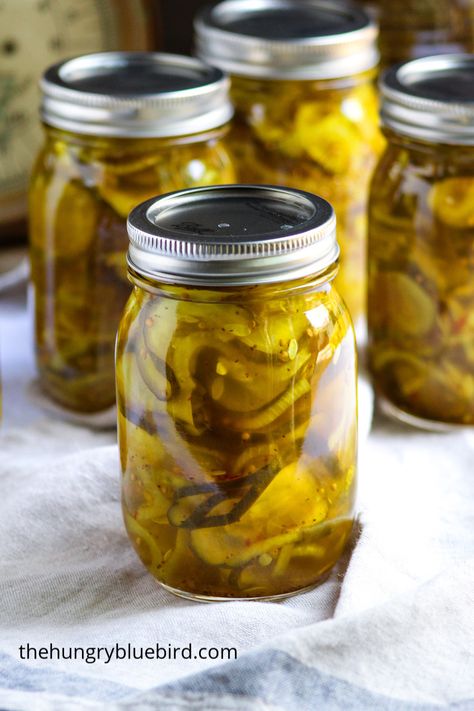 Bread and Butter Pickles ~ sweet and tangy, crunchy and a little spicy, these are the BEST pickles! Easy canning recipe to capture summer in a jar. #thehungrybluebird #breadandbutterpickles #canningrecipe #homemade #easyrecipe #picklesrecipes Bread And Butter Pickles Canning, Bread N Butter Pickle Recipe, Pickles Canning, Pickle Recipes Homemade, Bread And Butter Pickles, Easy Canning, Best Pickles, Butter Pickles, Canning Pickles